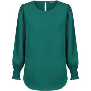 A green top with a round neckline and shirred cuffs, featuring puffed sleeves and a back keyhole detail.