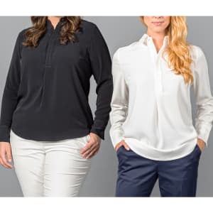 A black and a white Quinn 1/2 Placket shirt on models, featuring a collar and a relaxed fit. Both have logos.
