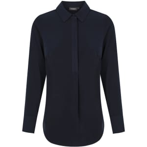 A navy shirt featuring a half placket, long sleeves, and a collar. The design includes a logo.