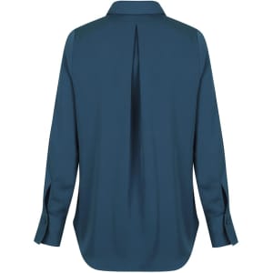 A teal shirt with a half placket and a back pleat, featuring long sleeves and buttoned cuffs. It has a logo.