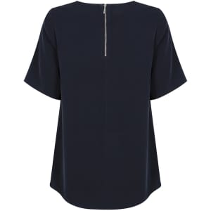 A navy short sleeve shirt featuring a back zipper and a relaxed fit. The shirt has a simple design and includes a logo.