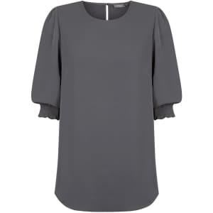A grey blouse featuring shirred cuffs and a rounded neckline, with a button closure at the back.