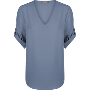 A blue V-neck shirt featuring rolled sleeves and a branding label on the neckline.