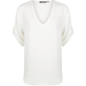 A white v-neck shirt with rolled sleeves and a subtle brand logo.