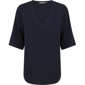 A navy blue V-neck shirt with short sleeves and a logo on the neckline.