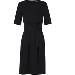 A black dress featuring a fitted bodice, short sleeves, and a tied waist detail. It has a branding label on the back.