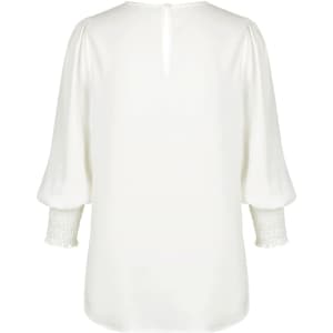 A white shirt with a v-neck and puffed sleeves, featuring gathered detailing on the cuffs. It has a back button closure.