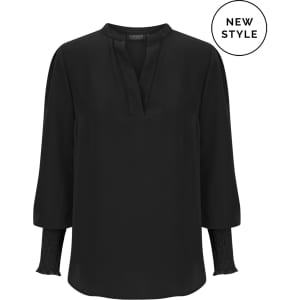 A black long sleeve top with a relaxed fit and a v-neckline, featuring gathered detail on the sleeves.
