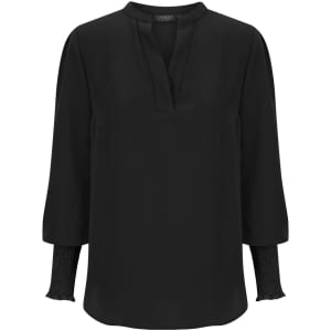 A black long sleeve top featuring a relaxed fit and textured sleeves, complete with a subtle neckline.