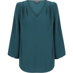 A teal V-neck popover shirt with three-quarter bell sleeves and a smooth fabric finish. Features a branding label.