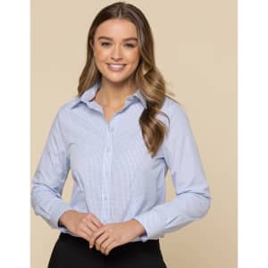 A button-up shirt in light blue with a check pattern, featuring a collar and long sleeves. It has a logo.