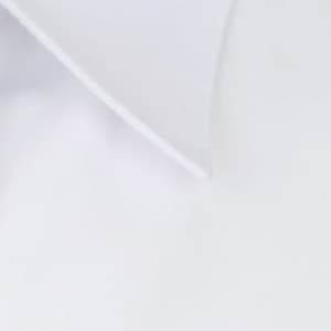 A close-up of a white button-up shirt collar, featuring a logo on the fabric.