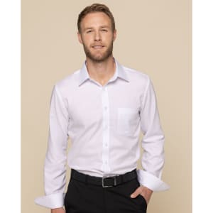 A button-up shirt in white, featuring a front pocket and long sleeves, modelled by a man against a neutral background.