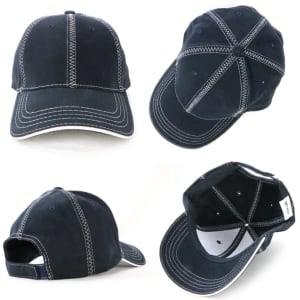 A navy blue cap featuring contrasting white stitching and a logo. The cap has a classic curved peak and adjustable strap.