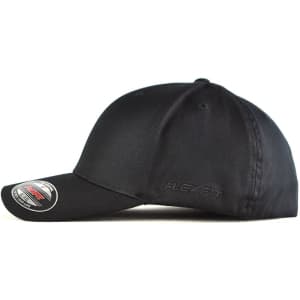 A black FLEXFIT cap with a curved brim and a fitted design, featuring branding on the side.