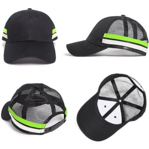 A black trucker cap with a mesh back and green stripes, featuring a logo on the front panel.
