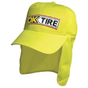 A bright yellow safety cap with a flap at the back and a logo on the front.
