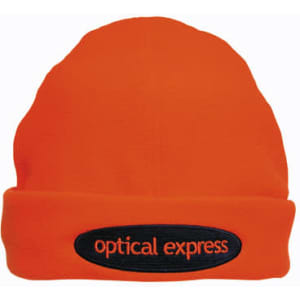 An orange beanie with a black patch featuring a logo. The beanie has a soft, textured appearance.