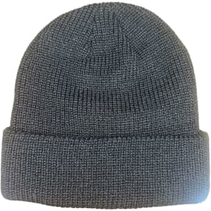A grey knitted beanie with a 6-seam design and a folded cuff, featuring a logo.