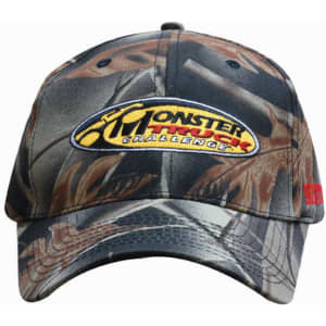 Leaf print camouflage cotton twill cap featuring a logo, primarily in shades of green and brown.
