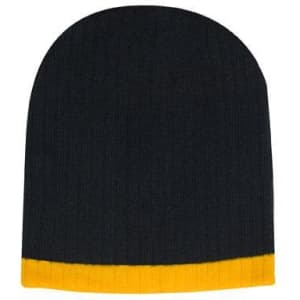 A two-tone cable knit beanie in navy blue and yellow, featuring a logo on the side.