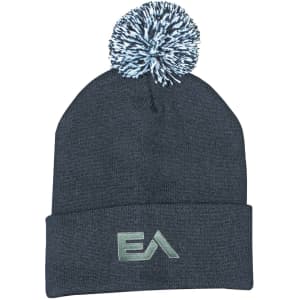 Acrylic beanie in dark grey with a fluffy pom pom on top and a logo at the front.