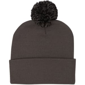 Acrylic beanie in a dark grey colour featuring a pom pom on top. It includes a folded cuff for added style.