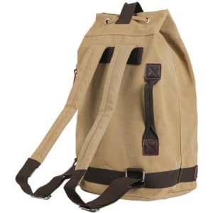 A tan canvas backpack with a drawstring closure and brown straps, featuring a logo on the side.