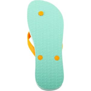 A pair of PVC beach flip flops in mint green with orange straps and a textured sole. Features a logo.
