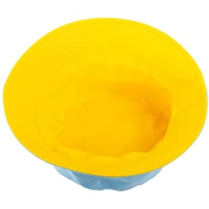 A solid reversible travel bucket hat featuring a bright yellow exterior and a light blue interior. It has a logo.
