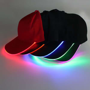 A set of baseball caps in various colours featuring LED lights along the brim. Each cap has a logo.