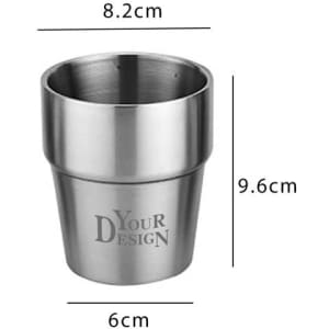 A stackable stainless steel cup in silver, featuring a logo, with dimensions detailed in centimetres.
