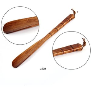 A custom wooden shoe horn with a smooth finish and natural wooden colour, measuring 32 cm in length.