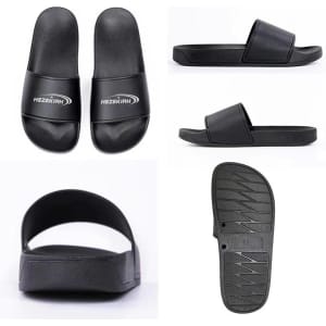 A pair of black PVC non-slip slippers featuring a logo on the strap and a textured sole for grip.