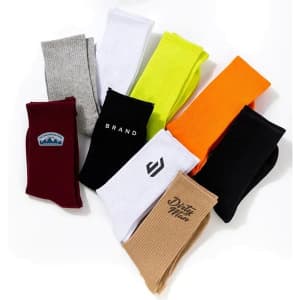 Custom combed cotton sports socks in various colours, including grey, white, orange, black, and maroon, featuring different logos.