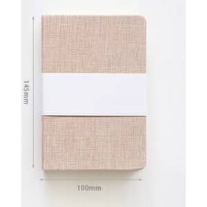 A classic cloth bound notebook in a beige colour, featuring rounded edges and a white band around it.