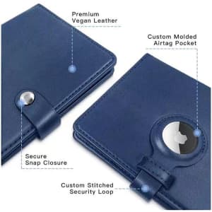 A navy blue genuine leather passport holder featuring a secure snap closure and a custom moulded Airtag pocket.