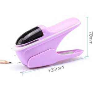 A purple hand stapleless stapler with a transparent top, measuring 135mm by 70mm, beside a pencil.