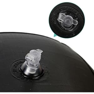 A close-up of a black inflatable toy with a transparent valve for inflating and deflating.