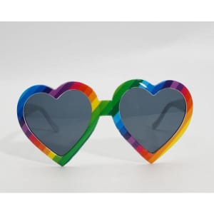 Rainbow heart-shaped sunglasses with multicoloured frames and dark lenses. The frames feature vibrant stripes.