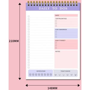 A purple and white coil notebook with sections for daily tasks, priorities, notes, and mood tracking.
