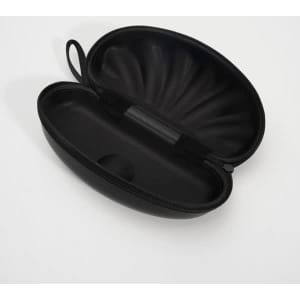 A shell-shaped black EVA glasses case with a textured exterior and a smooth, spacious interior.