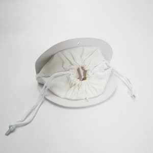 A white glasses case with a drawstring closure, featuring a circular top. It includes a logo.