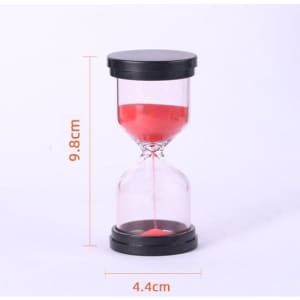 A sand timer with a pink interior and black top and base, measuring 9.8 cm tall and 4.4 cm wide.