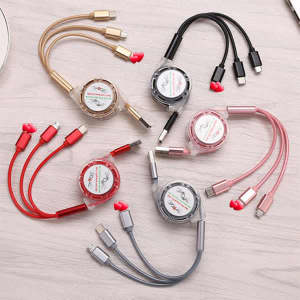 A set of five 3-in-1 retractable multi charging cords in gold, clear, black, red, and pink, each with a logo.