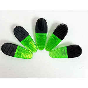 Five oval plastic magnetic clips in bright green and black arranged in a fan shape. Each clip has a textured grip.