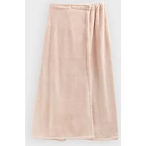 A women's adjustable bath wrap in a soft blush pink colour, featuring a textured fabric and an elastic band.