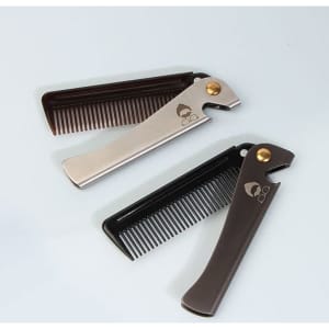 Two custom stainless steel beard combs in silver, black, and dark brown, featuring a logo on the side.