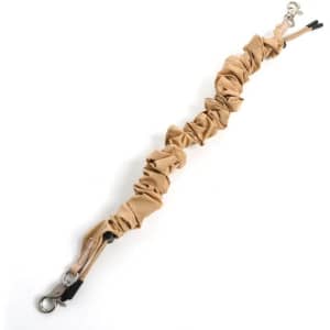 A beige scrunchie keychain wristlet strap with clips at both ends and a textured fabric design.