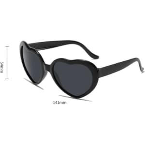 Heart-shaped sunglasses in black with dark lenses, featuring a branded logo. Dimensions: 141mm wide, 54mm high.